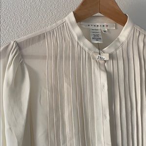 cream silk blouse
